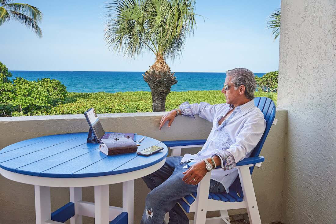 bret sitting at his trading desk